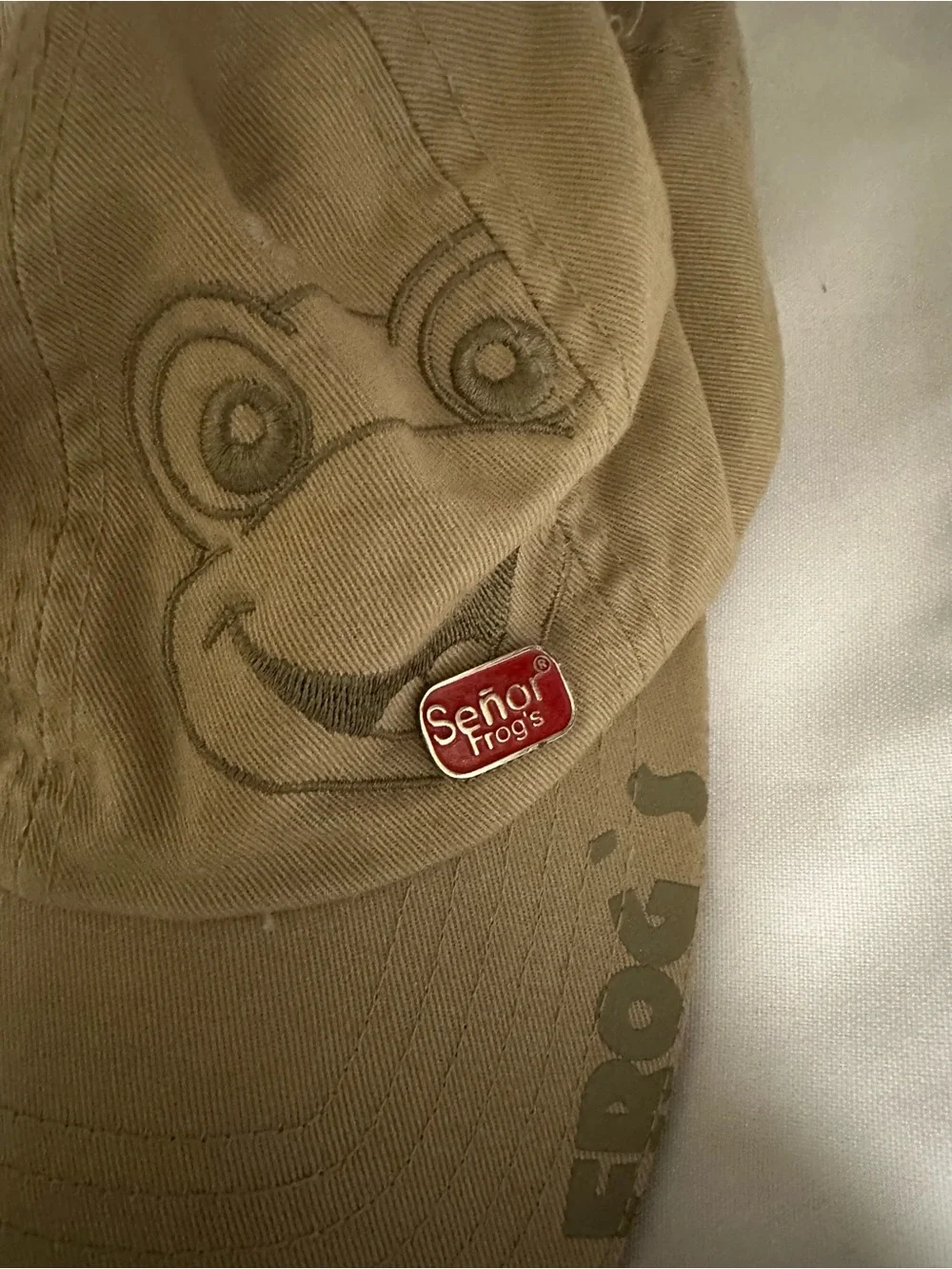 Señor Frog's Khaki Cap with Red Logo Pin